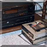 E23. Pioneer receiver and Magnavox portable VCR.